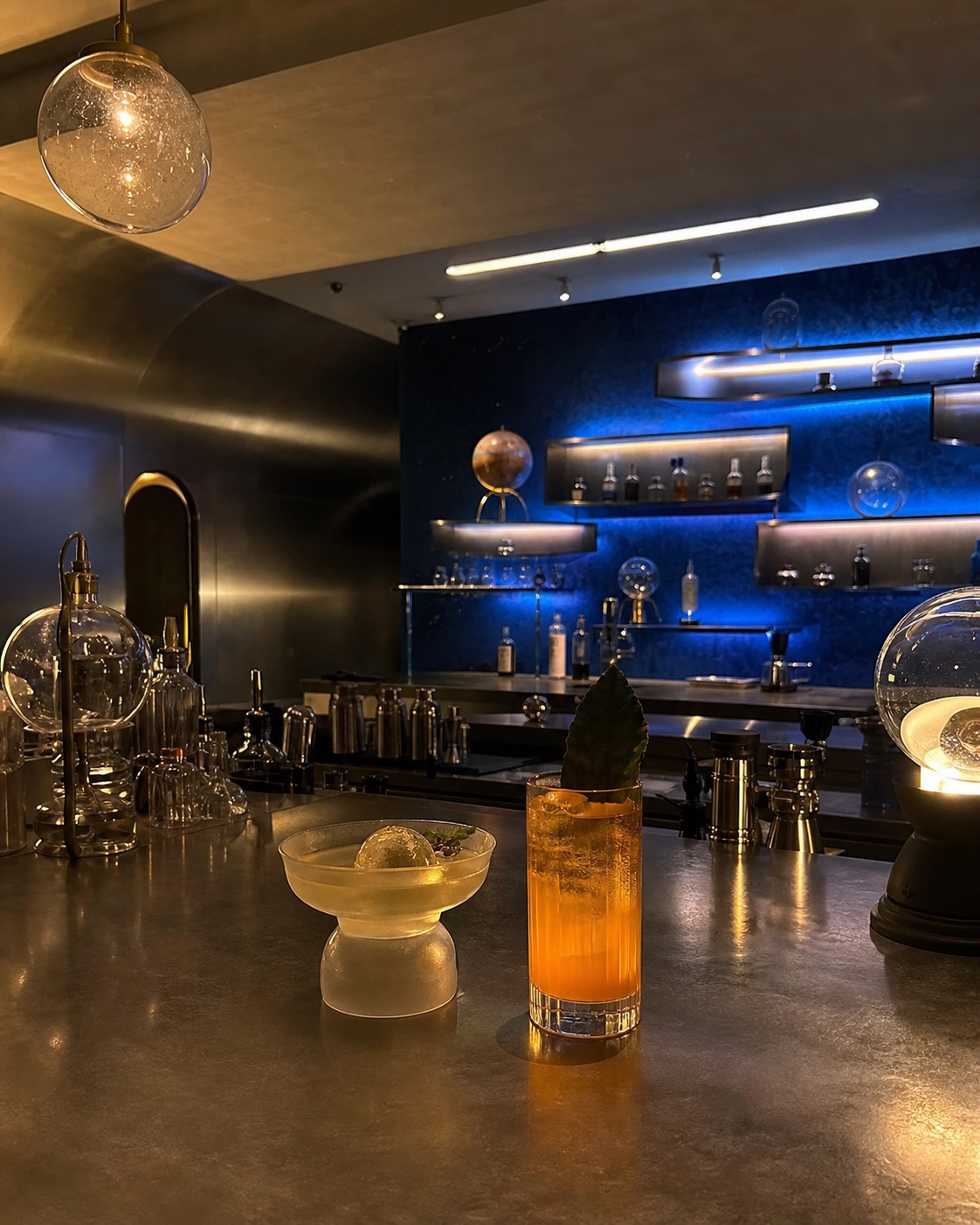 Representative science-inspired Taipei cocktail room with two drinks